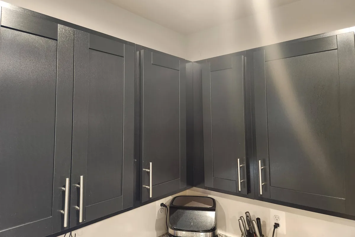 Cabinet doors with newly installed handles