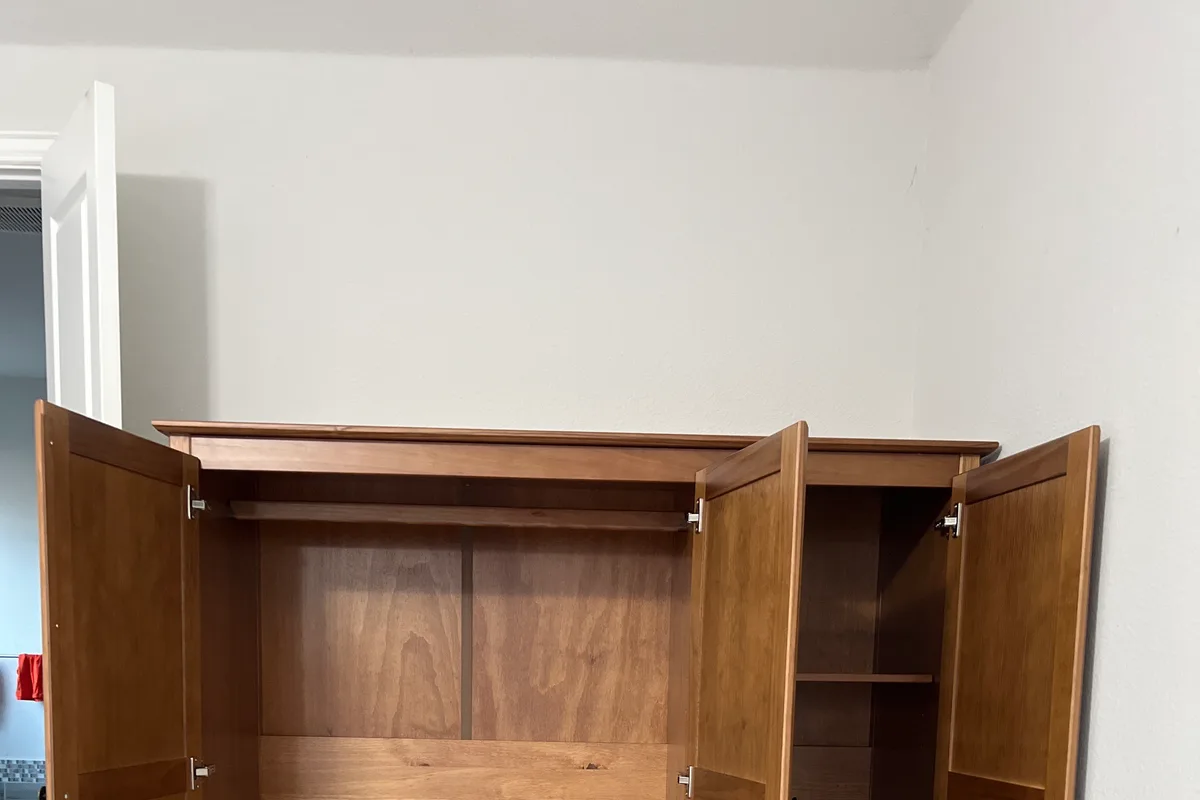 Completed wooden wardrobe assembly