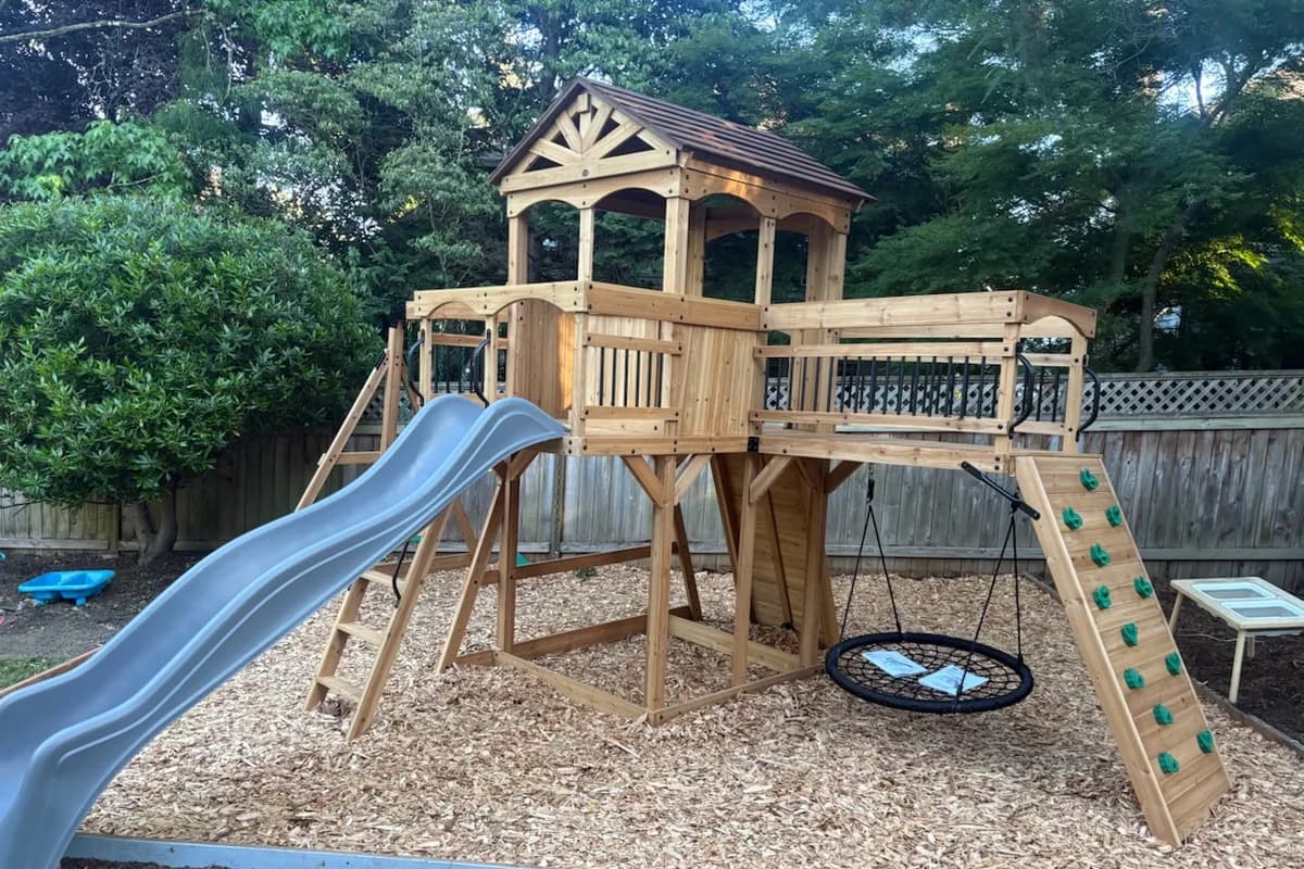 Completed wooden backyard playset